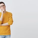 serious thoughtful man making assumption looking right thinking 1 1 scaled