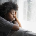 triste mulher reflexiva com depressao melancolica 1 scaled