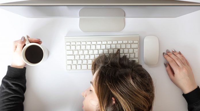 flat lay young woman asleep front computer 1 1 scaled
